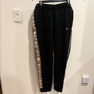 Nike Black Pants with Gold Chain Detail